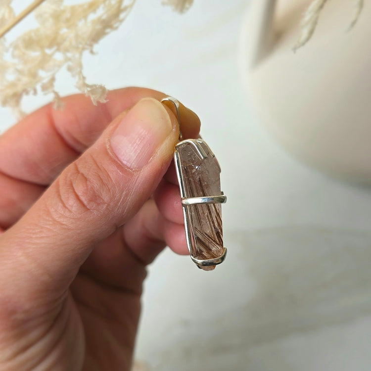 Golden Rutile in Clear Quartz Faceted Jewellery Pendant