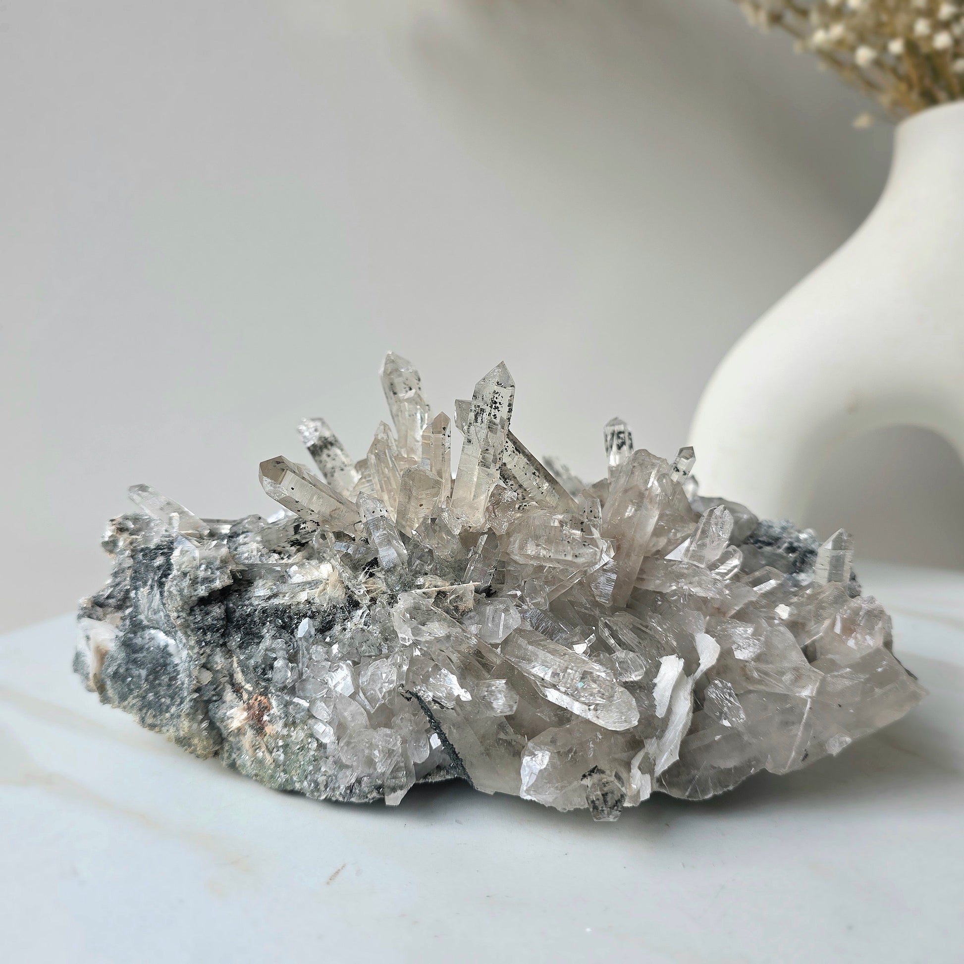 Clear Quartz Crystal Cluster on Matrix with Black Tourmaline Inclusions - Crystals and Me | Crystal Candles and Ethically Sourced Crystals